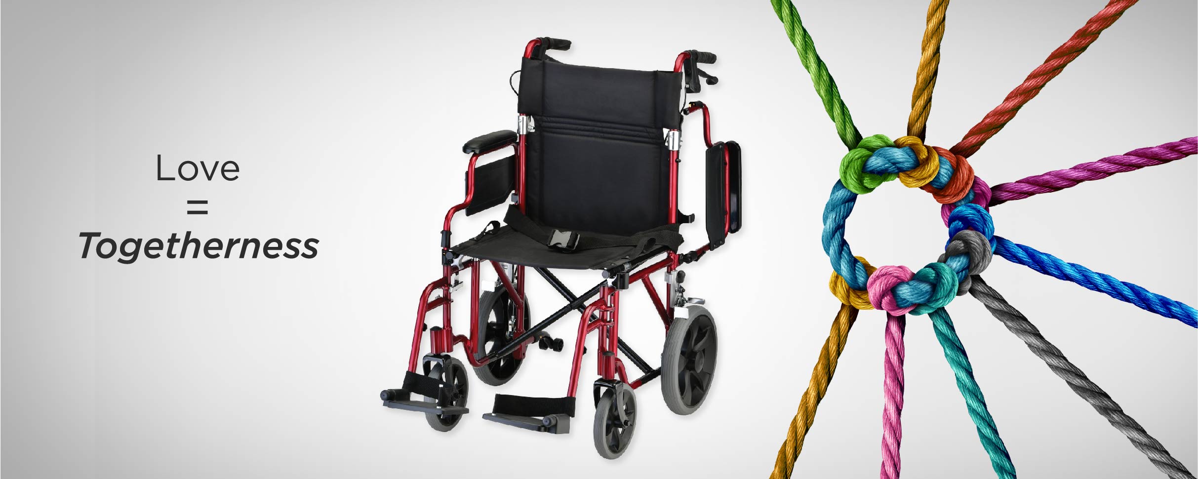 Wheel chair - black with red trim.  Love equals Togetherness